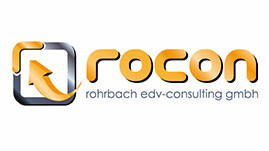 Das Rocon Logo der zweiten Generation bestehend aus einem viereck mit einem Pfeil in den Farben Gelb und Silber und dem rocon Schriftzug in Gelb